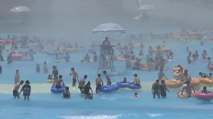 Crowds beat China heatwave at Shanghai waterpark
