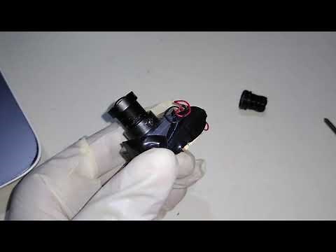 How to change CCTV camera lens