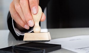 Phân biệt đóng dấu treo và dấu giáp lai