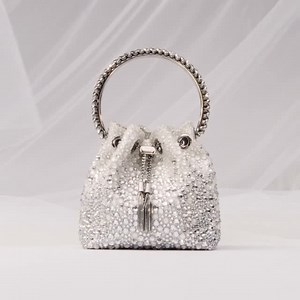 24 reactions | Not just any accessory. Jimmy Choo’s exquisite bridal...