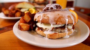 Salty, savory, and incredibly sweet. The coffee roll breakfast sandwich is for big breakfast lovers. | Phantom Gourmet
