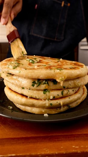 Brandon Gouveia on Instagram: "Jalapeño Popper Stuffed Garlic Naan! Insane Mashup full recipe below #stuffednaan #jalapenopopper #fusionrecipes INGREDIENTS Dough 3½ cups all-purpose flour, plus more for work surface 1 cup warm water ⅓ cup plain Greek yogurt ¼ cup olive oil 1½ tbsp sugar 2 tsp instant yeast 1 tsp kosher salt Jalapeño popper filling 8 oz full-fat cream cheese 4 oz (about ½ cup) grated mozzarella cheese 4 oz (about ½ cup) grated cheddar cheese 1 tbsp Worcestershire sauce 2 large ja