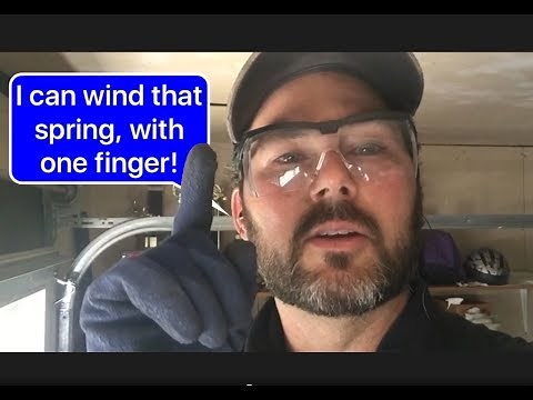 How to wind a garage door torsion spring with one finger!