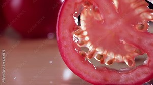 Tomato Falling in Super Slow Motion (1000fps) - Mesmerizing Fruit Impact Watch a mesmerizing super slow-motion video capturing a tomato falling and splattering on a board at 1000 frames