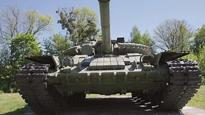 Download tank t80, armored vehicles with dynamic protection unit on street in green khaki color for free