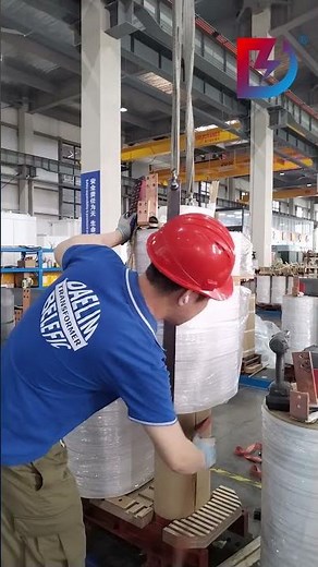 Assembling 2000kVA transformer windings onto the core