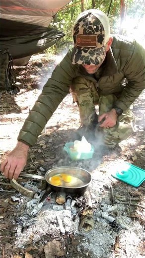 Good ole GI mess kit over an open fire!