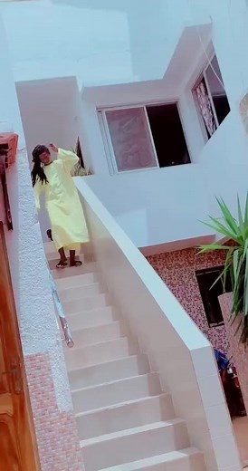 Baye Fall: Elegant Walk in a Long Yellow Dress