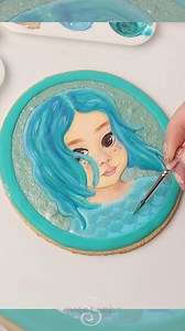 This Disney-fied cookie portrait of my daughter is one of three portrait cookies that I created as part of the #DisneyYourselfCollab on Instagram hosted by Burnt Cookies and You Can Call Me Sweetie. Sidney's portrait was inspired by her favorite movie, Luca ☺️ You can see all three of my Disney portrait cookies and read about the process of making them on my blog! https://www.sweetambs.com/tutorial/disney-portrait-cookies/ | SweetAmbs
