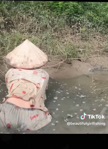 Beautiful Girl Fishing by the River