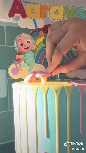 Colorful Cocomelon Drip Cake Design