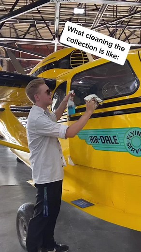 Cleaning a Taylorcraft at the Algoma Marina Museum