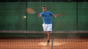 The physics behind the tennis drop shot