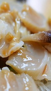 🐚🍣 This giant clam is sliced fresh and served raw for the ultimate chewy, ocean-sweet bite — a rare seafood treat straight from Okinawa. Would YOU try geoduck sashimi? #JapaneseFood #StreetFood #Okinawa #Geoduck #Sashimi | Travel Thirsty