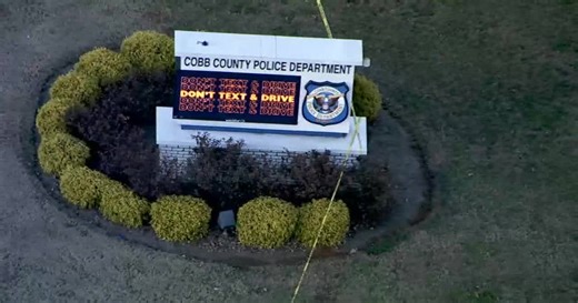 Woman shot by police at Cobb County police headquarters