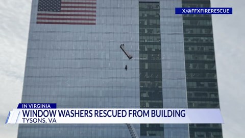 2 window washers seen hanging on side of Tysons high-rise building during rescue