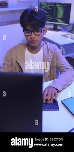 Focused Male Programmer, Software Developer working on Desktop Computer, looking at Screen sits at office workplace. Professional IT Programmer Developing Application, Program Writing code at Office Stock Video Footage - Alamy