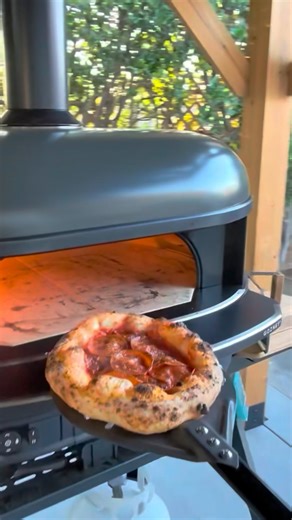 Chilling with some pizza on the Gozney Dome Gen 2XL