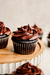 11K views · 60 reactions | These chocolate cupcakes are rich, moist, and packed with deep cocoa flavor. They bake up with a soft crumb and pair perfectly with any frosting—though a swirl of chocolate buttercream never hurts. Simple to make, impossible to resist. https://thestayathomechef.com/chocolate-cupcake-recipe/ | The Stay At Home Chef | Facebook