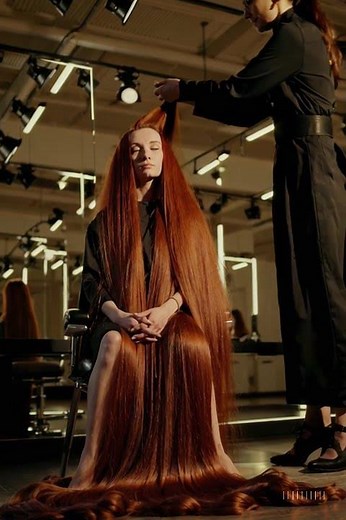 Floor Length Red Hair in a Salon