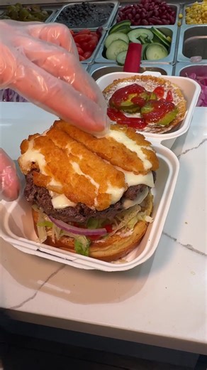The HEART ATTACK BURGER from @halalmunchies786 in NYC! Locations all over the city. 🍔🧀💥 Anyone else love mozzarella sticks on their burgers? 😏 #DEVOURPOWER #fyp #foryou #foodtiktok #halal #halalfood #nychalal #halalnyc #halalmunchies #burger #cheeseburger #mozzarellasticks #nycfoodies #nycfoodblog