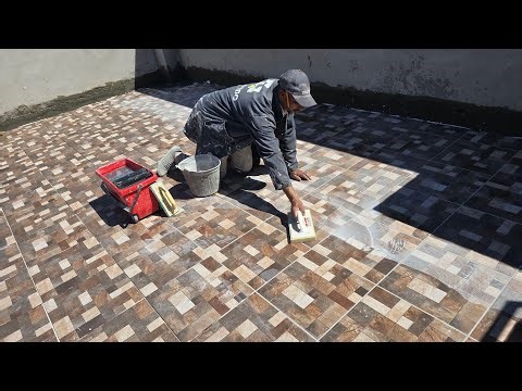 How to professionally fill the gaps between porcelain and ceramic tiles