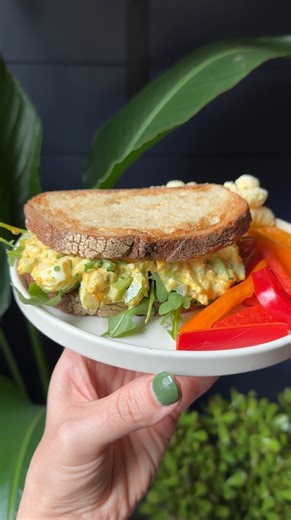 This simple Curried Egg Salad is quick to throw together and a fun twist on a classic recipe. Enjoy it on a sandwich or straight from the bowl! It’s filled with protein and great for a takeaway lunch! Ingredients ▢2 hard boiled eggs ▢¾ teaspoon of curry powder ▢1 ½ teaspoons of dijon mustard ▢2 tablespoons of mayo ▢2 tablespoons of chives or green onion ▢⅓ cup of diced celery ▢salt and pepper to taste ▢toasted bread and greens for serving Instructions 1. Start by hard boiling your eggs if you ha