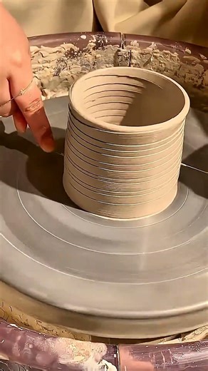 Clay Coils Rising on Spinning Wheel Vessel Walls Spiral into Form #shorts