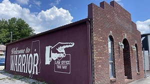 Correction: The mysterious church buying up a town in Alabama: ‘What is it about Warrior?’