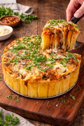 Sausage Honeycomb Pasta Ingredients: * Olive oil * 4 cloves garlic, minced * 1/2 tsp. crushed red pepper flakes * 1 28-oz jar marinara sauce * 1/2 cup fresh basil leaves, chopped * 1 lb. Large rigatoni pasta * 23 string cheese, cut in half. * 8 ounces fresh mozzarella * 1/2 cup Parmesan cheese, shredded * 1 pound Italian sausage, cooked DIRECTIONS 1. Preheat the oven to 375 degrees. Grease a 9-inch springform pan with 1 Tbsp olive oil and bring a large pot of generously salted water to a boil. C