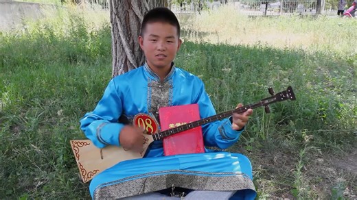The Tovshuur, also known as topshuur or topshur, is a traditional Turkic & Mongolian stringed musical instrument primarily associated with the Western Mongolian & Turkic tribes such as the Oirats, Altai Urianghais, Altais, Tuvans, and Khalkha peoples. Its history traces back to at least the 13th century, during the time of the Mongol Empire under Genghis Khan, although similar stringed instruments may have existed even earlier among Turkic and Mongolic tribes. The Tovshuur played a significant r