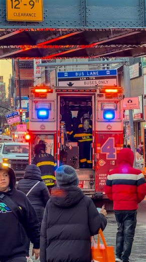 FDNY Rescue 4 packs up after battling a 2-Alarm fire on busy Flushing Main Street. The fire was in a 3 story commercial, with fire on the 2nd and 3rd floors. | FDNY Response Videos