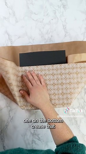 Wrapping tutorial! If you want your gifts to look like a professional wrapped them this year, give this wrapping technique a try. It creates pleats that can serve as pockets for cards or decorations. 🎁 video credit: @The DIY Mommy® #giftwrappingidea #wrappingtutorials #wrappingtechniques #holidaywrappinghacks #ilovehacks