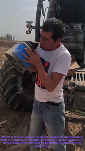 Tractor Air Filter Cleaning: Blowing Out Dust from Farm Equipment
