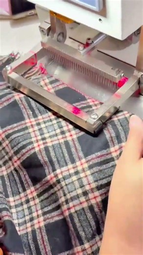 Automated Fabric Fringing Machine Creating Perfect Decorative Edges on Plaid Textile