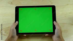 Woman Using Horizontal Tablet - Various Hand Gestures - Green Screen. Tablet with Green Screen. Black color tablet green screen. Stock Video