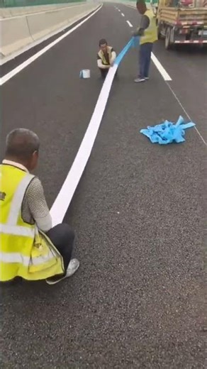 one of the processes of coating a road and making road signs#shorts #viral