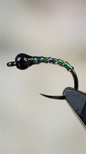Fulling Mill on Instagram: "The Oil Slick Buzzer by Signature Tyer @fritofry is an excellent chironomid/buzzer pattern for stillwater trout fishing. The subtle segmentation and big contrast in colors are key in making this fly stand out to the fish. If you’re looking for an easy-to-tie and super effective chironomid to tie up and fish this season, this buzzer is the one! #flyting #nymphing #chironomids"