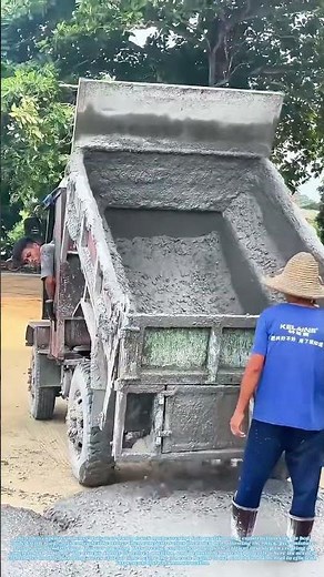 Concrete Choreography: The Rear-Dump Truck’s Dance on the Job Site