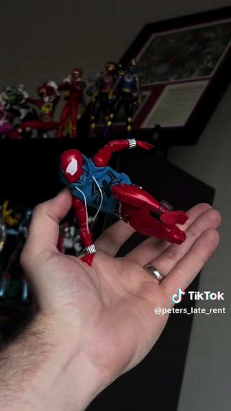 Exploring Poses of the Scarlet Spider Action Figure