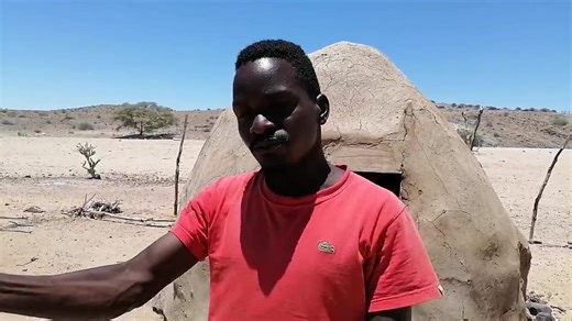 Life at the Himba Village: The Struggle of a Small Himba Community near Uis on the northern side of Namibia, a small Himba community of about 32 ,families has been living in the area of Uis for the past three years. But their stay has never been permanent. For years, they have been moving up and down the mountains, searching for a better place to live and farm. Even here, life is extremely difficult. The biggest challenge is water. The community has to walk about 14 kilometres to fetch water. Ph