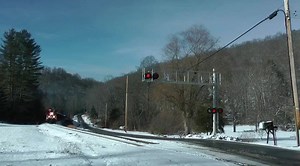 A pair of R. J. Corman Railroad Group EMD SD40T-2s lead a loaded coal train through Mount Hope, West Virginia on the former Chesapeake and Ohio Loup Creek Branch. Taken December of 2017. | North American Steel Veins