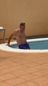 Man Slips and Falls While Getting into Pool