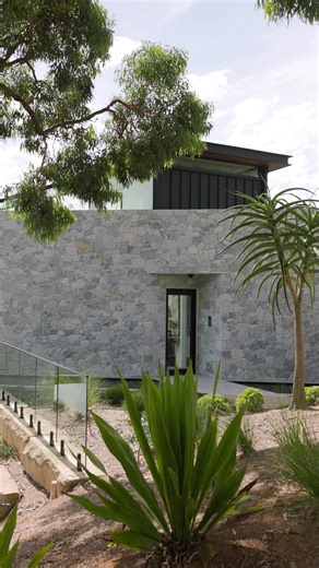 This home is the ultimate in ultra luxe living - and our Lagoon Natural Stone makes the most gorgeous statement for the front entrance. This home has all of those once in a lifetime things....glass rooftop infinity pool, private pontoon with mooring for your 100-foot boat, glass lift access to all four levels, 5 bedrooms, 6 bathrooms, triple car garage, stunning designer kitchen..... and a shark tank. Yes, you read that correctly, a shark tank. This home has to be seen to be believed, and lucky 