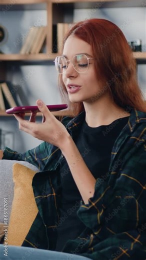 Portrait of joyful Happy woman calling phone. Girl holding smartphone calling using voice assistant. Technology advanced user, share voice messages, remote communication concept. Slow motion.