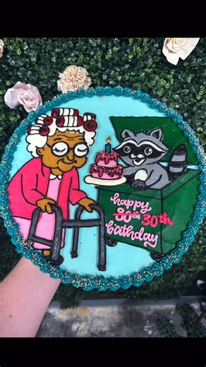 Hayleycakes And Cookies on Instagram: "I wish I had taken a picture of the actual customer request, because this was a doozie in the BEST way lol. A 30th birthday girl entering her grandma era who works in waste management. Say less 😂 #cookiecake #cakedecorating #grandmahobby #raccoon #texasbakery"