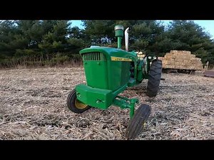 John Deere 3010 baling corn stalks (Go Pro 4K)