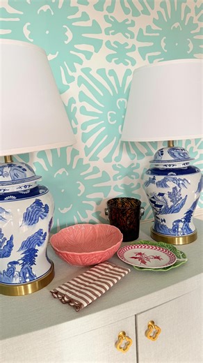 Lindsey Black on Instagram: "Here we go! 🤎🩵🩷💚💜 Design takes time! Next up… scheming art for this large blank wall 🙌🏻 and pleated lamp shades that POP against the wallpaper! Tip: pull random objects around your house to see what colors could “work” in your space! Happy Friday! stay warm, friends! What’s the weather where you are? ❄️ it’s 5 {FIVE} degrees here 🥶 #wallpaperinspo #diningroomdesign #largeartwork #pleatedlampshades"