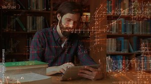 Student using a tablet computer in a library