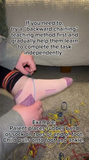 Taking off and putting on socks can be tricky for little hands! 🧦✨Try this simple rubberband trick!